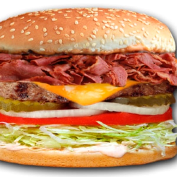A Jim's Burgers pastrami cheeseburger with lettuce, tomato, onions, and pickles on a sesame seed bun.