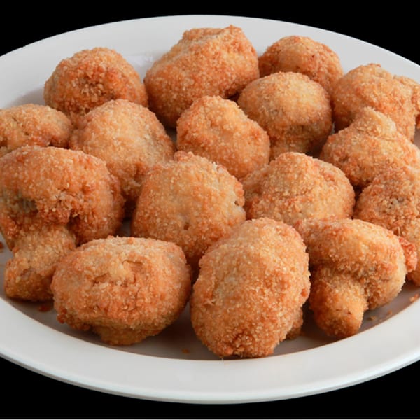 A white plate filled with golden-brown breaded mushroom bites from Jim's Burgers.