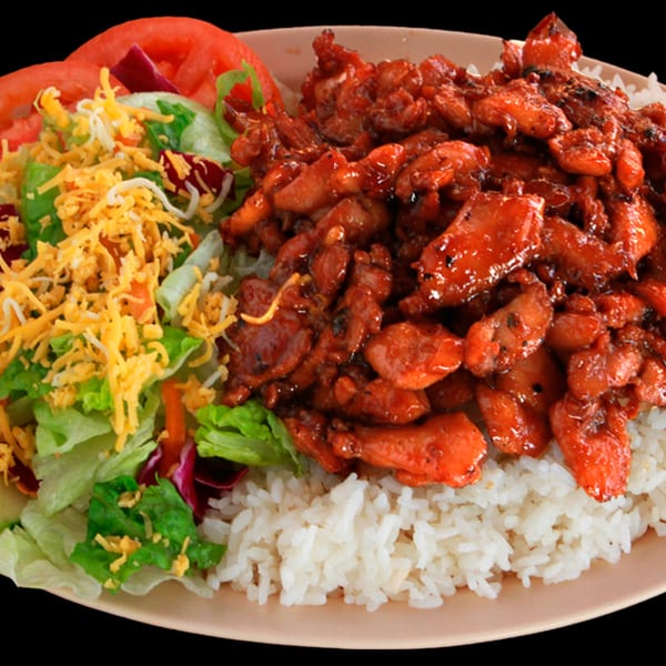 A plate of Jim's Burgers teriyaki chicken, white rice, and a side salad with shredded cheese.